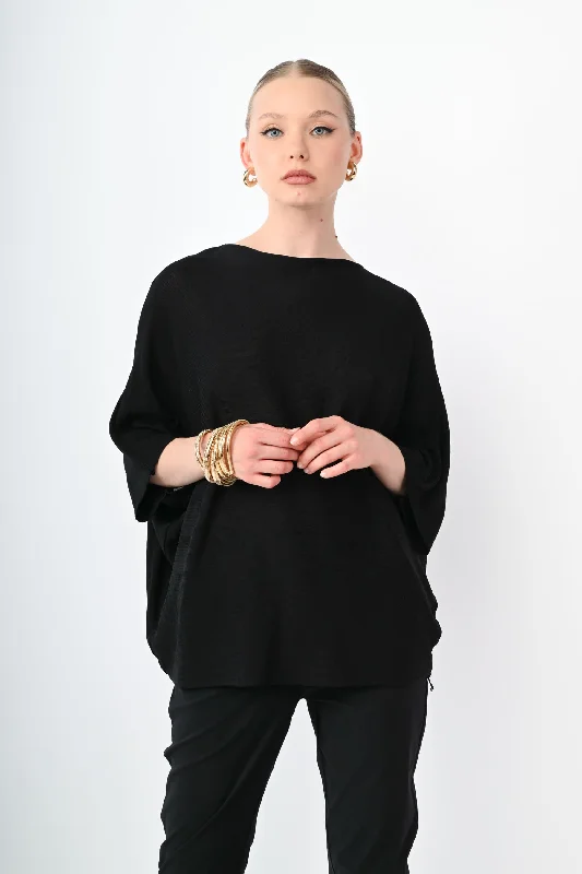 Top in maglia con maniche a pipistrello