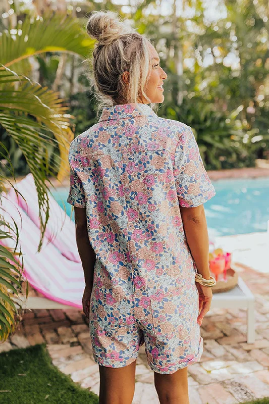 sunny-with-a-chance-of-blooms-denim-romper-in-pink